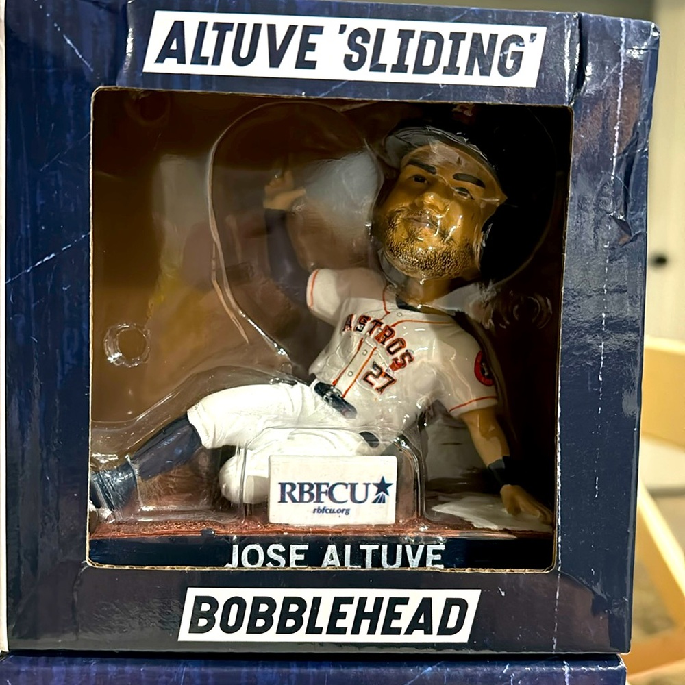 Bobble head of Jose Altuve sliding Collectible